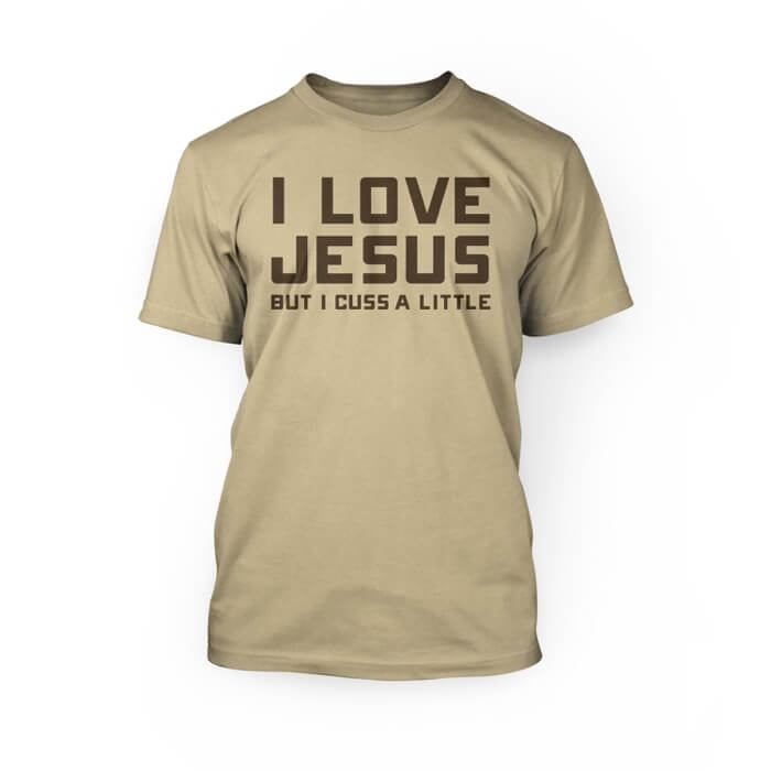 "Brown i love jesus but i cuss a little lettering on the front of a soft cream crew neck unisex t-shirt"
