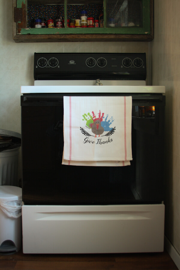 Give Thanks Tea Towel On Oven