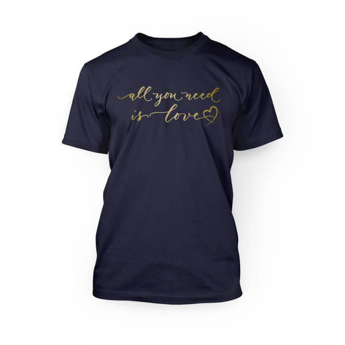 "gold all you need is love scripted font with a graphic heart on the front of a navy crew neck unisex t-shirt"