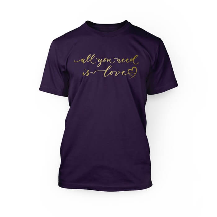 "gold all you need is love scripted font with a graphic heart on the front of a team purple crew neck unisex t-shirt"