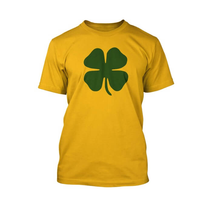 "green clover on the front of a gold crew neck unisex t-shirt"