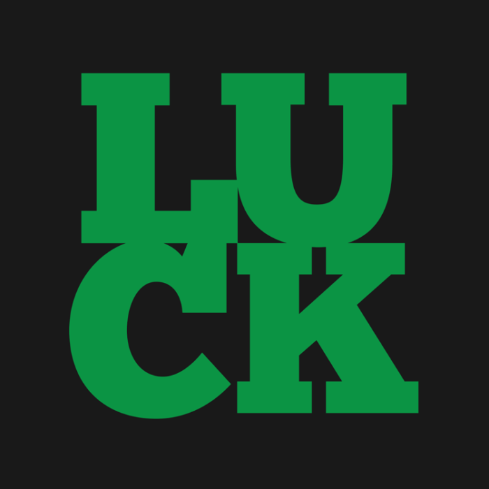 "green luck word on the front of a black square image"